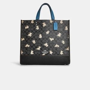 Coach Dempsey 40 in. dog print tote bag